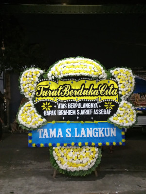 Papan Bunga Duka di Talia