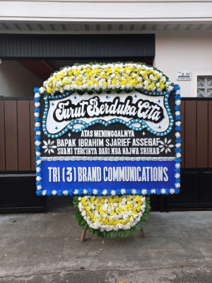 Papan Bunga Duka di Talia